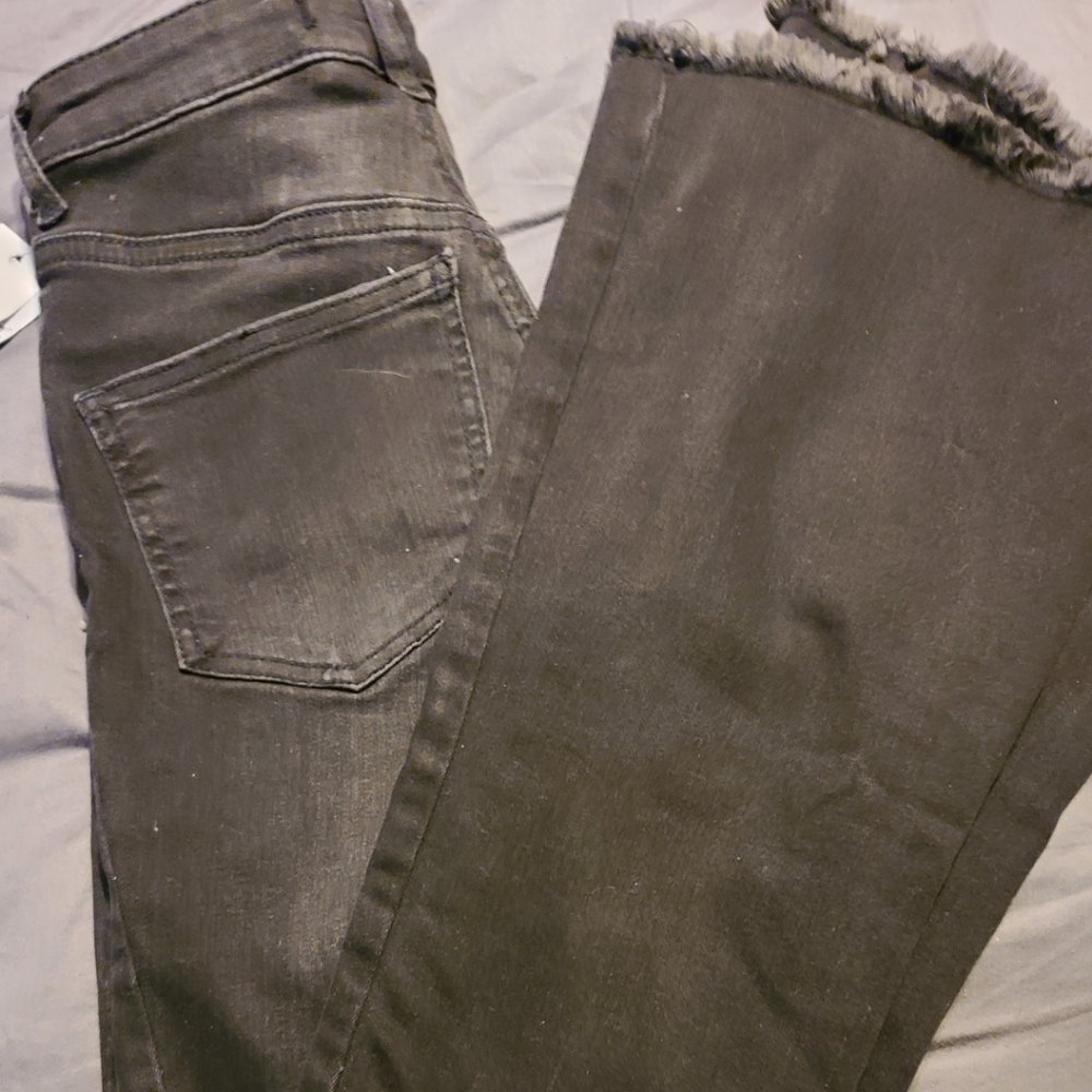 Free People Black wash Flare Jeans sz 25 NWT .